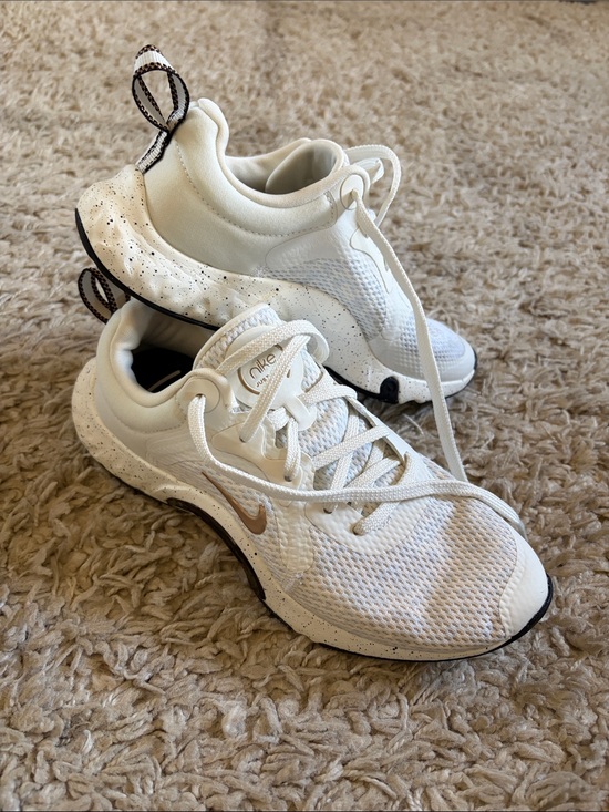 Nike Shoes - Nike Women’s White Mesh Athletic Sneakers with Metallic Gold Swoosh